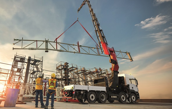 Construction worker truss installation