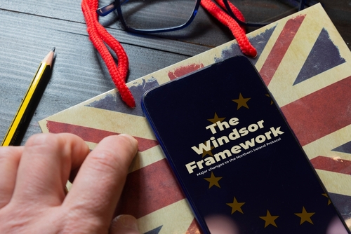 Windsor,Framework,Agreement,Concept:,Smartphone,Over,A,Paper,Bag,On